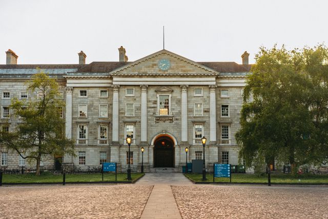 Elegant view of the iconic Trinity College façade in Dublin, Ireland.